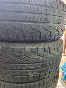 235/55R18 - 4