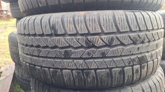 235/55R17 - 4