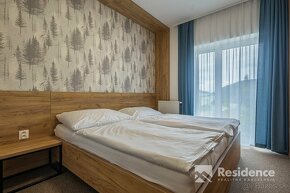 Luxusný horský dvojspálňový apartmán s parkovacím státím v l - 4