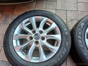 hlinikové disky org.-Mazda-6,5Jx16-ET-50--5x114,3 - 4