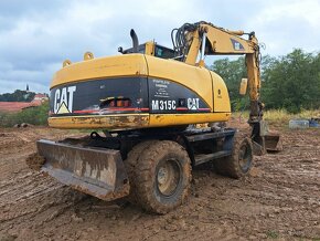 CATERPILLAR M 315 C 4X4 - 4