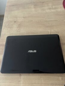 Asus x556u - 4