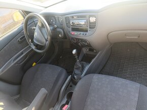 Kia Rio 1.4i - 4