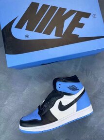 Nike Air Jordan 1 Retro High OG UNC Toe - 4