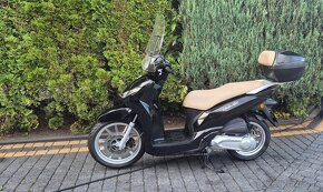 Peugeot Belville SH liberty 125 cm3 pcx - 4