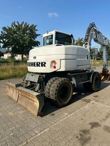 Kolový otočný bagr LIEBHERR A309 - 4