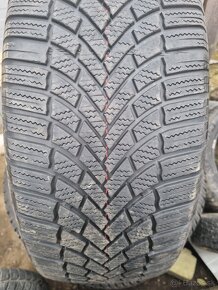 235/55R18 - 4