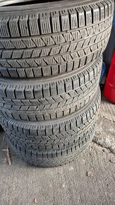 235/65R18 - 4