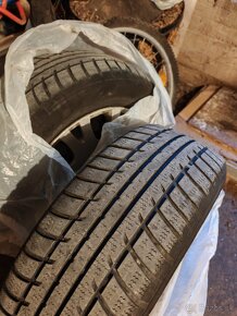 Preu na diskoch 215/60 R16 - 4