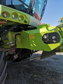 Predám kombajn CLAAS Lexion 670 + žací stôl V750+prepravník - 4