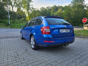 ŠKODA OCTAVIA COMBI 2.0 TDI / XENON / NAVI / LEHKÉ POŠKOZENÍ - 4