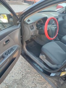 Kia Rio 1.4 2009 - 4