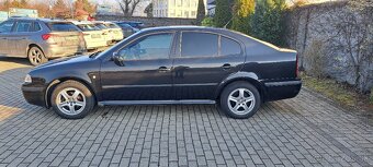 Škoda Octavia 1.6 benzín 74KW TOP STAV - 4