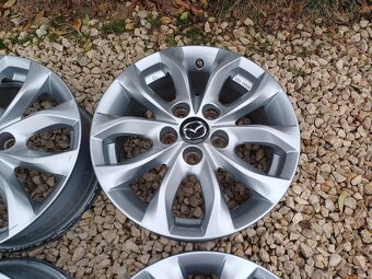 hlinikové disky org.Mazda 3--6,5Jx16--ET-50--5x114,3 - 4