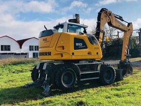 Kolesové rypadlo Liebherr A910 - 4