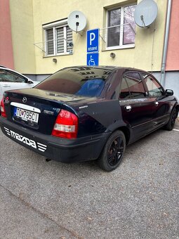 Mazda 323 sedan - 4