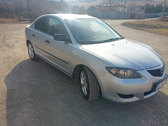 Mazda 3 sedan - 4