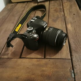 Nikon D5100 + 18-55 AF-S DX VR - 4