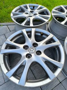 4x100 R16 Mazda alu disky - 4