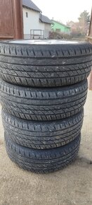 Plechové disky Opel + puklice + letné gumy 205/55 R16 - 4