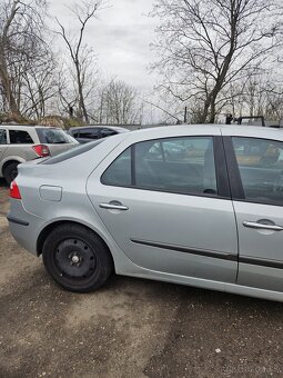 Renault laguna.        2004      1.9dci - 4