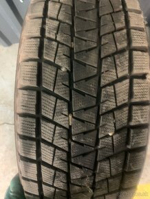 265/60R18 - 4