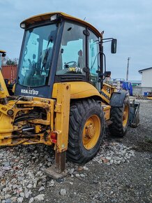 Komatsu WB 97S5 - 4