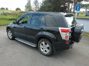 Suzuki Grand Vitara III 2.0i - 4