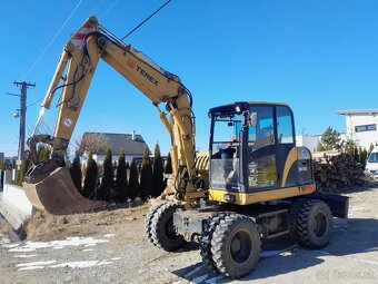 Otočný kolesový báger TEREX tw85 - 4