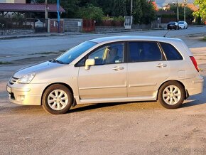 Suzuki Liana 1.6 i 4x4 benzín 78 kW Strieborná metalíza - 4