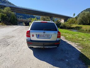 Škoda octavia scout 2 4x4 2,0 tdi 103 kw BMM - 4