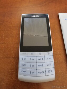 Tlacidlovy telefon Nokia X3 - 4