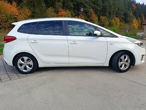 Kia Carens - 4