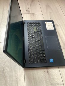 Asus E510 - 4