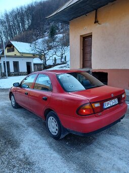 Mazda 323i - 5