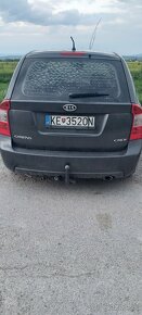 Kia carens - 5