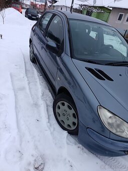 Peugeot 206 .1.4. 55KW - 5