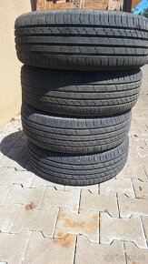 225/60R18 104W - 5