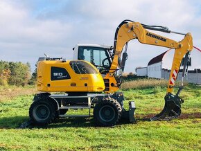 Kolesové rypadlo Liebherr A910 - 5