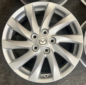 5x114,3 R17 Original Mazda strieborne - 5