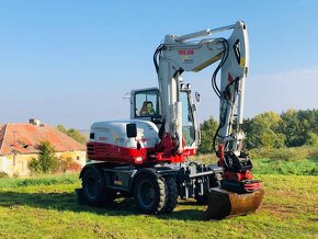 Kolesové rypadlo Takeuchi TB295W - 5