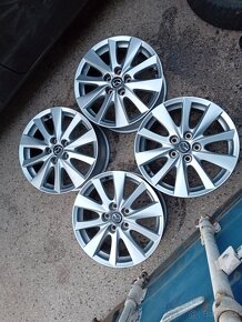 MAZDA ORIG.ALU DISKY.7×17/ET50/5×114,3 - 5