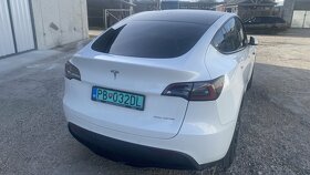 Tesla model Y - 5