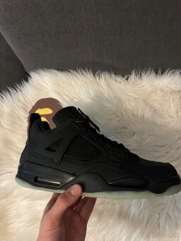 Jordan 4 black kaws - 5