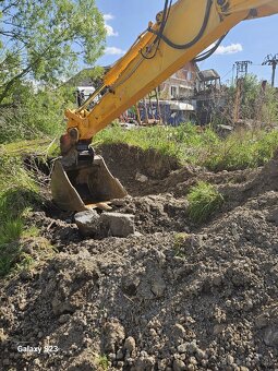 Pásový bager JCB 130 - 5