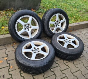 Zimní Kola 5x100 Audi VW Seat Skoda Toyota 195/65R15 - 5