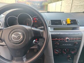 Mazda 3 1.4 - 5