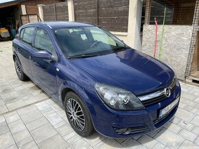 Opel astra H 1.6 - 5