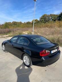 BMW e90 318d 2006 - 5