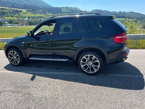 BMW X5 4.8i - 5